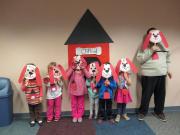 kids with Clifford the Big Red Dog masks