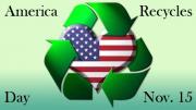 Recycling symbol hugging a heart with the American flag on it.