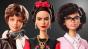 Three posed dolls from Barbie® representing famous women in history.